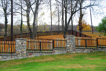 Image showing Stone and wooden fence