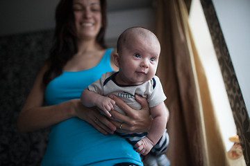 Image showing Young mother with baby