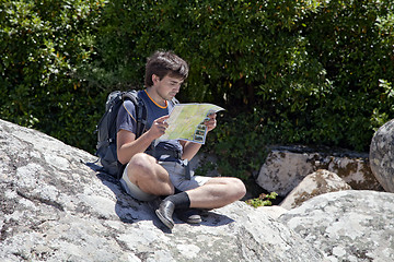 Image showing Young tourist with a map