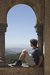 Image showing Young man in arabian arch of  Pena palace, Sintra