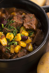 Image showing Tasty winter traditional hot pot stew with meat and vegetables 