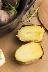 Image showing  baked potatoes with herbs butter