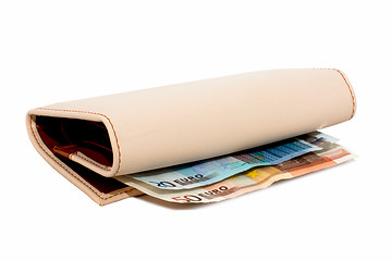 Image showing Monetary denominations lie in a wallet on a white background