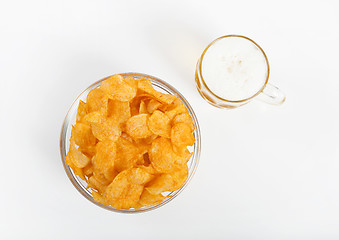 Image showing Potato chips with beer glass