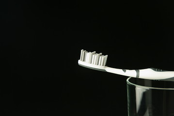 Image showing toothbrush on a glas