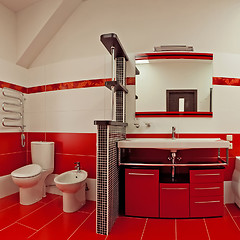 Image showing Modern bathroom with red ceramic walls