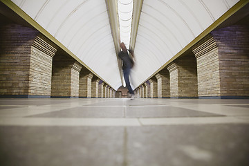 Image showing Blurred man on subway platform