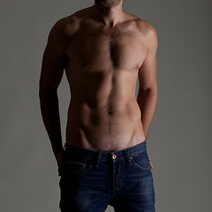 Image showing Sexy muscular naked man in jeans 