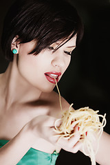 Image showing woman with spaghetti