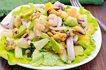 Image showing Salad seafood and avocado on board