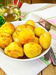 Image showing Potatoes fried on plate on table