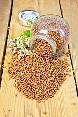 Image showing Buckwheat in glass jar and on board with flower