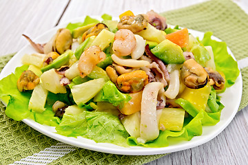 Image showing Salad seafood and avocado on light board