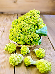 Image showing Broccoli green in wicker basket on board