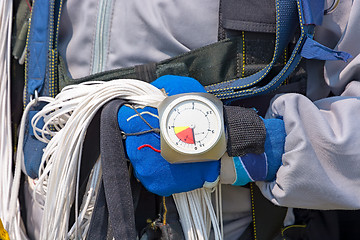 Image showing Skydiver hand in glove close-up.