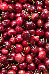 Image showing Freshly picked heap of cherries