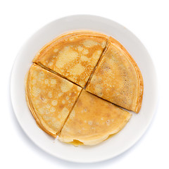 Image showing Pancakes stacked on a plate.