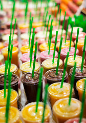 Image showing Plastic cups with fresh cocktails