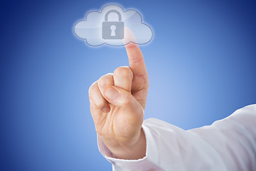 Image showing Finger Pushing Lock Button In Cloud Icon Over Blue