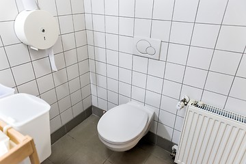 Image showing Opened door with toilet