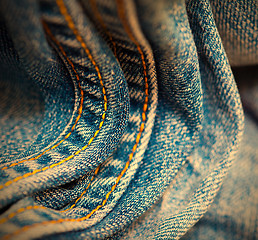 Image showing aged Jeans with yellow stitching thread