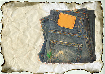 Image showing aged jeans on old paper