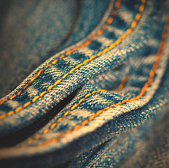 Image showing Jeans with yellow stitching thread