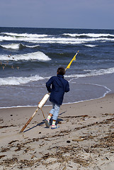 Image showing Girl with yellow flag