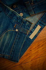 Image showing old unbuttoned jeans