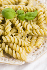 Image showing italian fusilli pasta and fresh homemade pesto sauce 