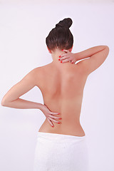 Image showing Woman with aching back and neck