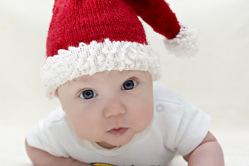 Image showing Small boy in knitted red hat