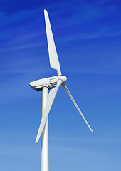 Image showing wind turbine against cloudy blue sky