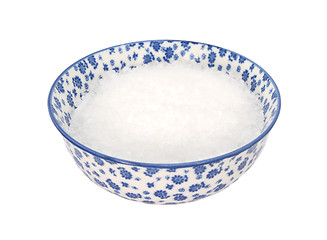 Image showing Coarse sea salt in a blue and white china bowl