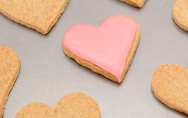 Image showing Close-up of an iced heart-shaped biscuit for Valentine's Day