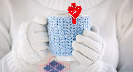 Image showing Knitted wool cup valentines day