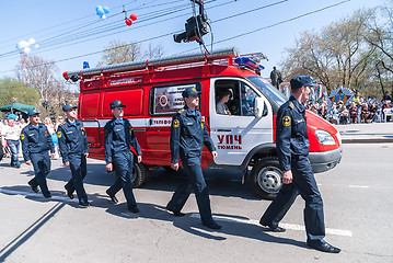 Image showing Employees and car of fire department on parade