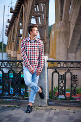 Image showing Handsome man outdoors over urban background