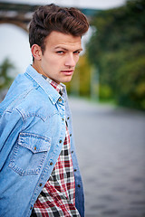 Image showing Handsome man outdoors over urban background