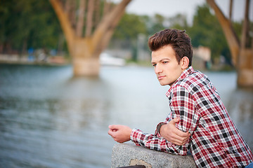 Image showing Handsome man outdoors over urban background