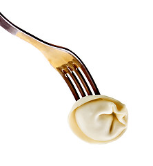 Image showing dumplings on a fork