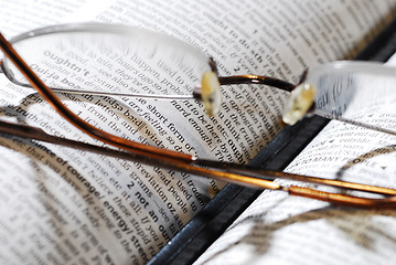 Image showing eyeglasses, book and pencil