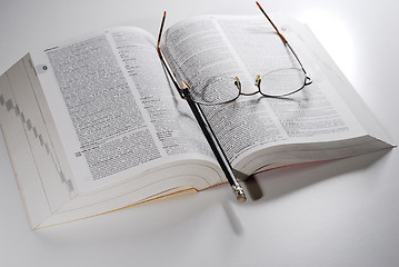 Image showing open book on a table