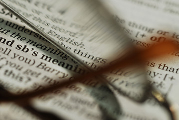 Image showing reading glasses and book