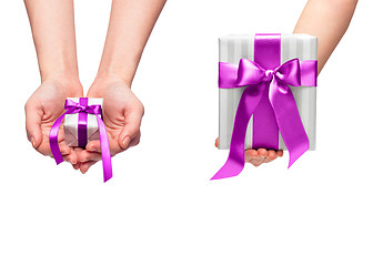 Image showing christmas gift with decorative pink ribbon bow