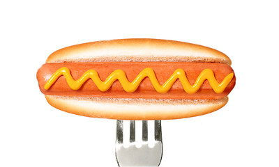 Image showing Close up of sausage and fork isolated on white background