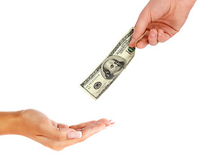 Image showing Hand giving money