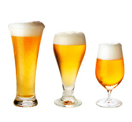 Image showing set with different glasses of beer on white