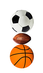 Image showing group of sports balls on a white