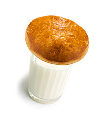 Image showing milk and bun isolated on white